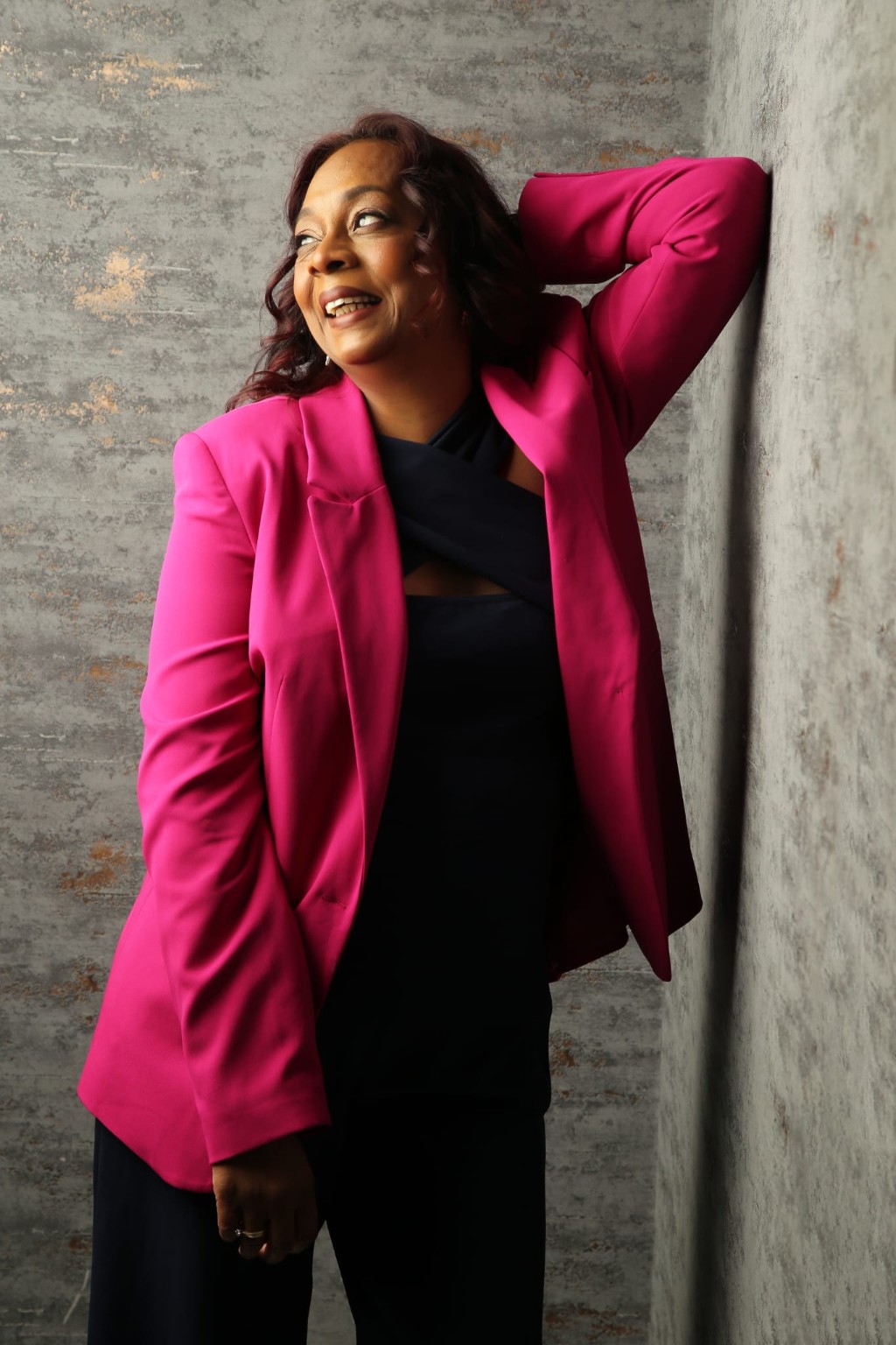 Diane smiling in a pink jacket